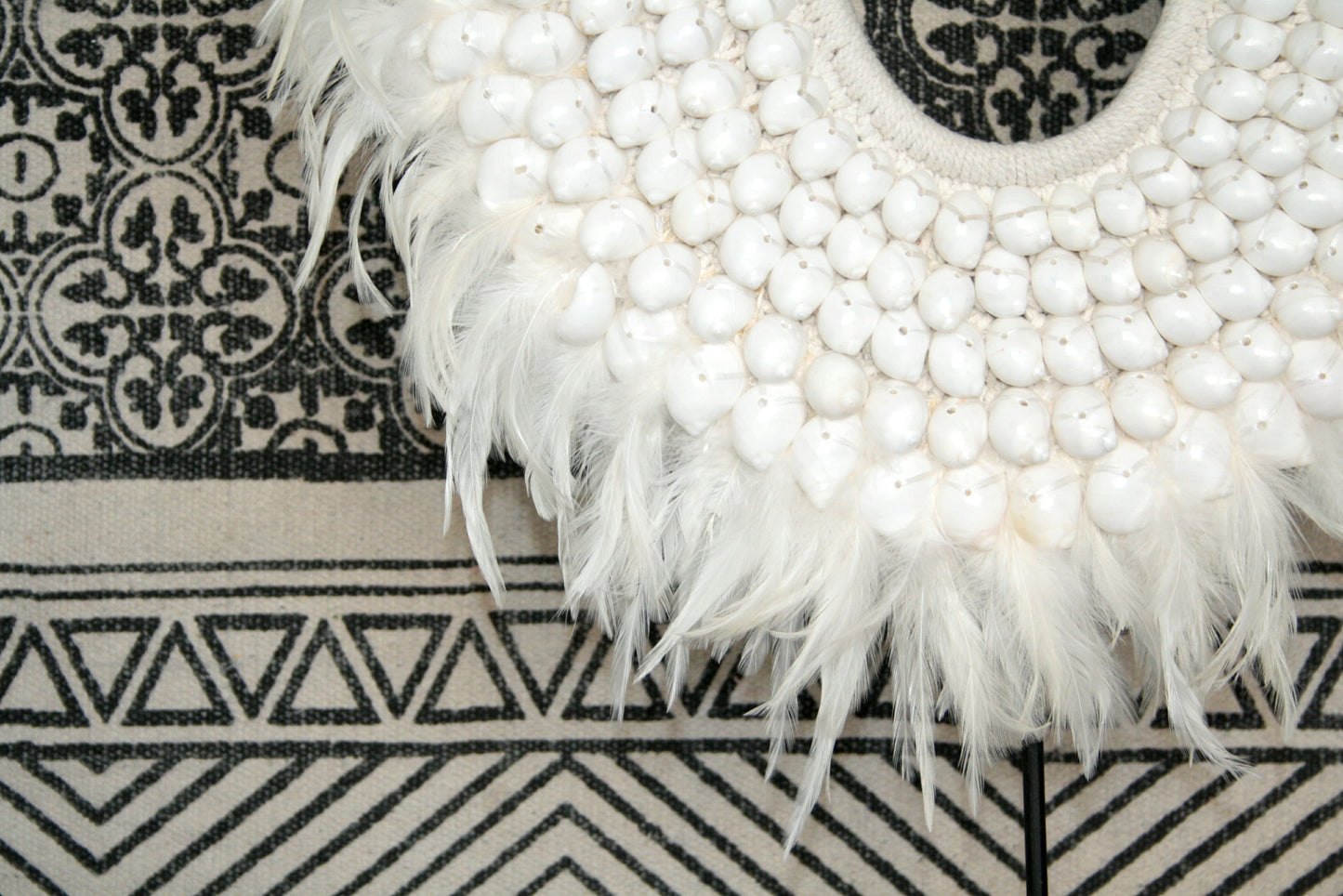 Collier papou sur stand