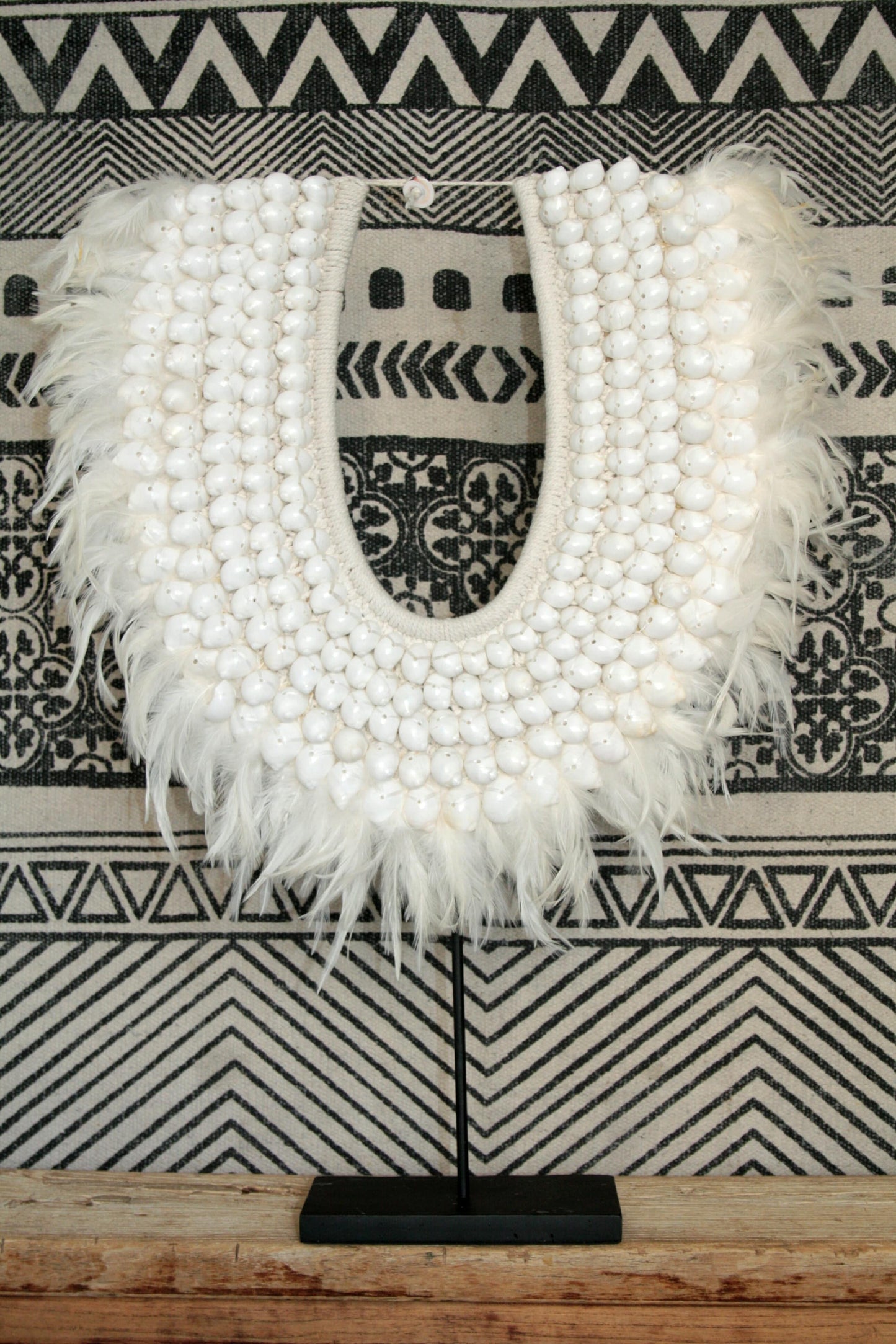 Collier papou sur stand